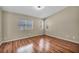 Spacious bedroom featuring hardwood floors, neutral walls, and bright, natural lighting at 544 Rancho Del Sol Way, North Las Vegas, NV 89031