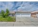 Charming single-story home with a three-car garage and well-maintained front lawn, offering curb appeal at 544 Rancho Del Sol Way, North Las Vegas, NV 89031