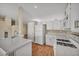 Functional kitchen featuring white cabinets and ample countertop space, perfect for meal preparation and entertaining at 544 Rancho Del Sol Way, North Las Vegas, NV 89031