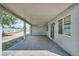 Large covered patio with concrete floor and ceiling fan, ideal for year-round outdoor living and entertaining at 544 Rancho Del Sol Way, North Las Vegas, NV 89031