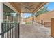 Inviting back patio with pavers, ceiling fan, and sliding glass doors, perfect for outdoor relaxation and entertaining at 5731 Sedona Springs St, North Las Vegas, NV 89031
