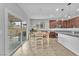 Bright kitchen features modern fixtures, granite countertops and stainless steel appliances at 5731 Sedona Springs St, North Las Vegas, NV 89031