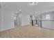 Spacious loft area with wood flooring, gray walls, and stylish metal railings, ideal for a flexible living space at 5731 Sedona Springs St, North Las Vegas, NV 89031