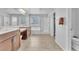 Modern main bathroom with dual vanities, a separate shower, a soaking tub, and elegant fixtures and finishes at 5731 Sedona Springs St, North Las Vegas, NV 89031