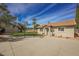 Charming single-story home with a well-maintained lawn, basketball hoop, and concrete driveway at 5840 N El Capitan Way, Las Vegas, NV 89149