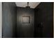 Modern shower with dark tile, dual shower heads, and a built-in niche at 5840 N El Capitan Way, Las Vegas, NV 89149