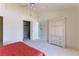 This bedroom boasts a large wardrobe and access to the ensuite bathroom at 653 Mountain Rdg, Mesquite, NV 89027