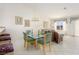 Bright dining area with glass table, seating for four, and ample natural light at 653 Mountain Rdg, Mesquite, NV 89027