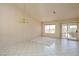 Inviting dining area with sliding glass door access to the patio and views of outdoor landscaping at 653 Mountain Rdg, Mesquite, NV 89027