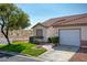 Charming home with a one-car garage, tile roof, and neat landscaping at 653 Mountain Rdg, Mesquite, NV 89027