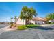 Inviting home exterior with lush lawn and shade tree on a corner lot at 653 Mountain Rdg, Mesquite, NV 89027
