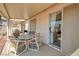 Covered patio with outdoor seating area, perfect for relaxing and enjoying the outdoor view at 653 Mountain Rdg, Mesquite, NV 89027