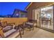 Cozy balcony with outdoor seating, perfect for relaxing and enjoying the evening at 6546 American Flower St, Las Vegas, NV 89148
