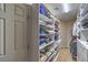Spacious walk-in closet with custom shelving offers plenty of storage space at 6546 American Flower St, Las Vegas, NV 89148