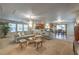 Inviting living area with open floor plan, seamlessly connecting to the kitchen and dining at 6546 American Flower St, Las Vegas, NV 89148