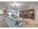 Spacious living room with modern decor, stylish furniture, and an open-concept layout at 6546 American Flower St, Las Vegas, NV 89148