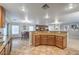 Spacious living space with kitchen, dining, and living room areas, with natural light and modern finishes at 6546 American Flower St, Las Vegas, NV 89148