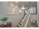 Bright staircase leading to the upper level, showcasing the home's inviting interior at 6546 American Flower St, Las Vegas, NV 89148