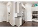 Bright white kitchen with stainless steel refrigerator and double ovens at 7340 Orchard Harvest Ave, Las Vegas, NV 89131