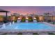 Inviting pool area with elegant water features and fire bowls creating a relaxing outdoor oasis at 7340 Orchard Harvest Ave, Las Vegas, NV 89131