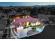 Stunning aerial view of the single-story home showcasing its well-manicured landscaping and spacious driveway at 7521 Dry Pines Cir, Las Vegas, NV 89129
