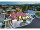 Beautiful aerial shot of the home nestled in a neighborhood with mature trees and manicured lawns at 7521 Dry Pines Cir, Las Vegas, NV 89129