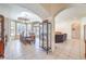Bright dining room with decorative chandelier and seamless flow to living area at 7521 Dry Pines Cir, Las Vegas, NV 89129
