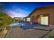 Outdoor oasis featuring a private pool, spa, and patio perfect for entertaining guests at 775 Porto Mio Way, Las Vegas, NV 89138