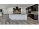 Spacious kitchen with a large island and stainless steel appliances at 775 Porto Mio Way, Las Vegas, NV 89138