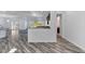 Open floor plan featuring modern light fixtures and tile flooring at 775 Porto Mio Way, Las Vegas, NV 89138