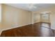 Spacious bedroom with hardwood floors, large closet with mirrored doors and a ceiling fan at 7950 W Flamingo Rd # 2066, Las Vegas, NV 89147