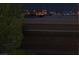 A distant view of the city at night with building lights at 7950 W Flamingo Rd # 2066, Las Vegas, NV 89147