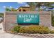 Rain Tree West community sign on stone wall at 7950 W Flamingo Rd # 2066, Las Vegas, NV 89147