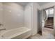 Bright bathroom with large tub and shower, and access to the upstairs hallway at 8087 Carpenter Creek Ave, Las Vegas, NV 89113