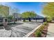 Gated community entrance with meticulously maintained landscaping and a secure entry point at 8087 Carpenter Creek Ave, Las Vegas, NV 89113
