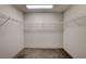 Large walk-in closet features wire shelving and carpet flooring, providing ample storage space at 8087 Carpenter Creek Ave, Las Vegas, NV 89113