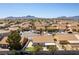 Panoramic aerial view of neighborhood featuring terra cotta roofs and mountain views at 812 Rio Poco Ct, Henderson, NV 89015