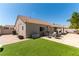 Exterior shot showcases the backyard, patio, and well-maintained landscaping at 812 Rio Poco Ct, Henderson, NV 89015