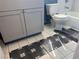 Charming bathroom with decorative tile flooring and updated vanity at 812 Rio Poco Ct, Henderson, NV 89015