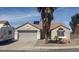 Charming single-story home features a xeriscaped front yard, a two-car garage, and an RV parked to the side at 812 Rio Poco Ct, Henderson, NV 89015
