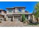 Charming two-story home with a three-car garage and well-maintained landscaping at 8212 Swallow Falls St, North Las Vegas, NV 89085