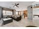 Open floor plan showcases the living room connected to the kitchen, with easy access to the upstairs at 8212 Swallow Falls St, North Las Vegas, NV 89085