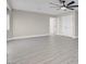 Bright bonus room featuring light gray wood floors and neutral paint at 8232 Ocean Terrace Way, Las Vegas, NV 89128