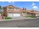 Charming two-story home with three-car garage, well-manicured lawn, and tile roof at 8232 Ocean Terrace Way, Las Vegas, NV 89128