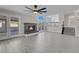 The living room has a fireplace, and glass doors that lead to the backyard at 8232 Ocean Terrace Way, Las Vegas, NV 89128