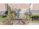 Aerial view of backyard showing a patio, desert landscaping, and privacy from neighboring homes at 8753 Fountain Island Dr, Las Vegas, NV 89147