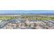 Real estate aerial showing city skyline in distance, nice landscaping and neighborhood at 8753 Fountain Island Dr, Las Vegas, NV 89147