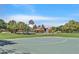 Community basketball court for sports and recreation, with playground visible in the background at 9009 Ochoa St, Las Vegas, NV 89143