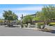 Community entrance with gate, landscaping, and signage welcoming residents and visitors at 9009 Ochoa St, Las Vegas, NV 89143