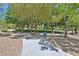 Picturesque park with walking paths, lush trees, and green spaces for outdoor activities at 9009 Ochoa St, Las Vegas, NV 89143
